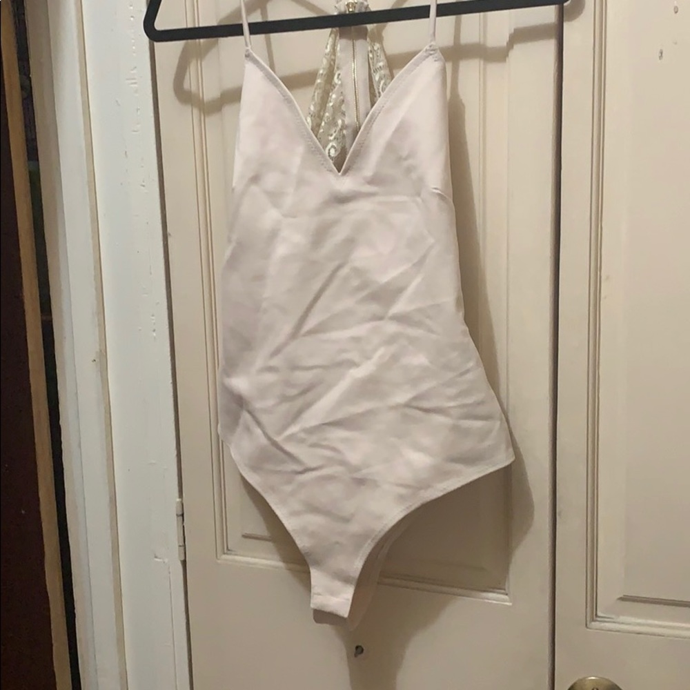 Lace back body suit size large